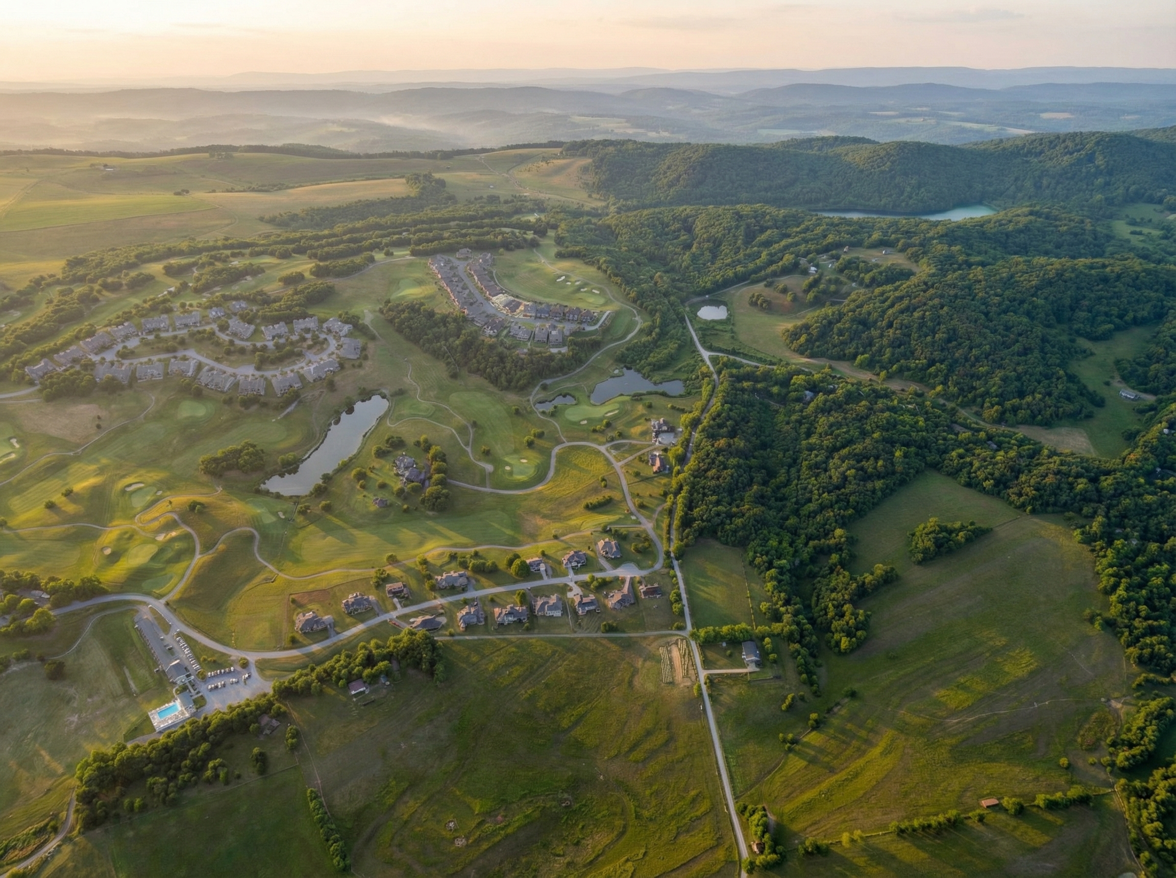 Wide view of rural Riner farmland, scattered homes, and rolling Montgomery County hills