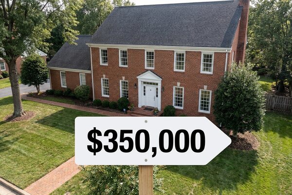 House exterior with $350,000 value sign