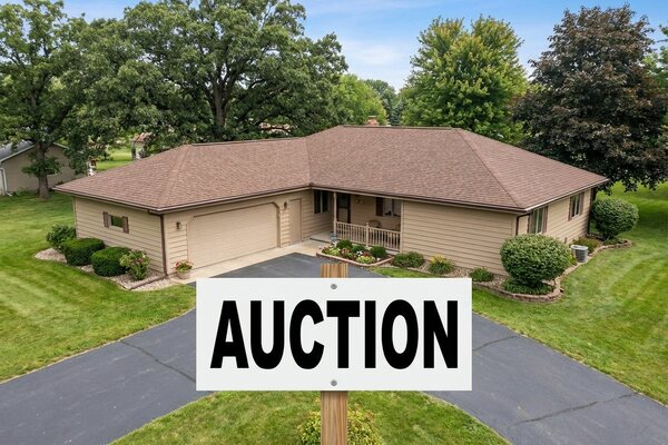 House exterior with AUCTION sign