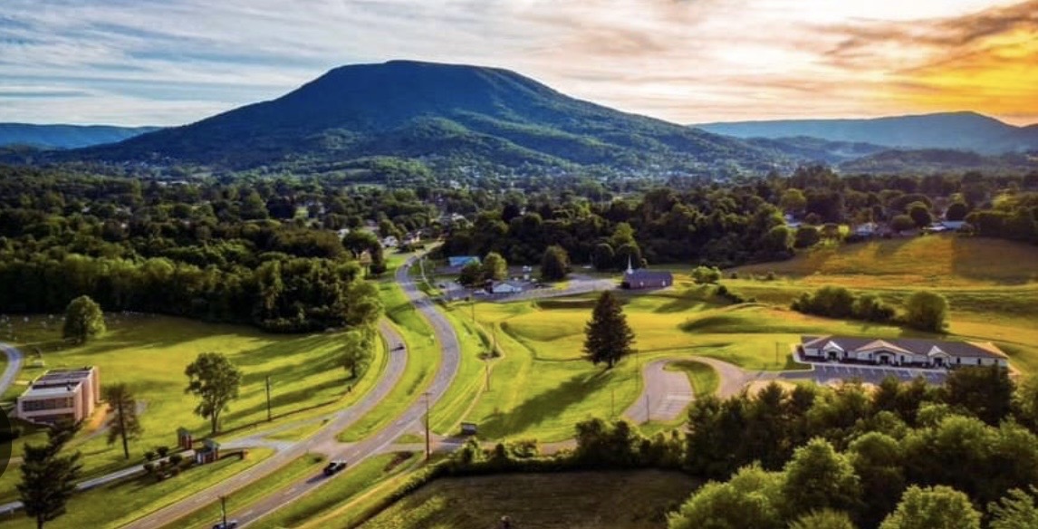 Wide view of Pearisburg streets, mountain scenery, and layered Appalachian ridges
